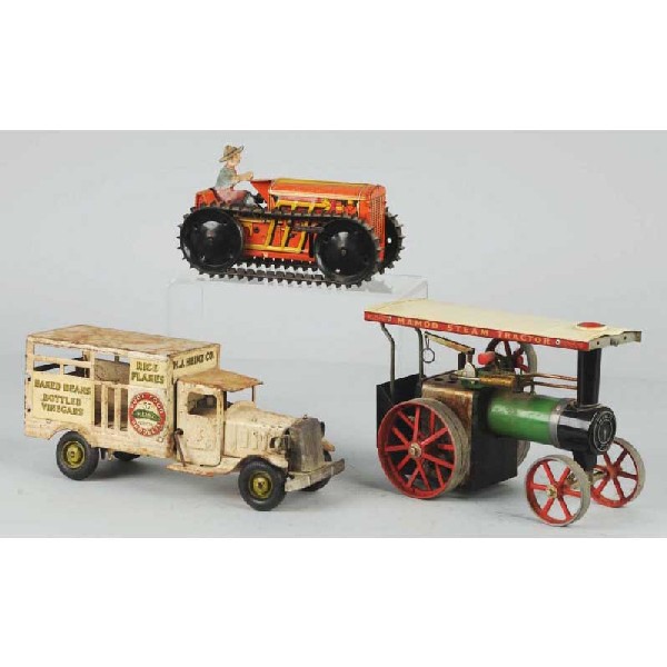 Lot of 3: Tin & Pressed Steel Vehicles.: Includes Metalcraft Heinz Pickle Truck, Marx wind-up Climbing Tractor, and Mamod Steam Tractor. Pickle truck is heavily rusted. Size: Largest: 12" L.