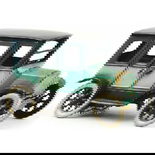 Tin Orobr Wind-Up Toy.: German. Working. Opening rear doors and original spare tire. Some moderate overall wear. Size: 6 - 1/4" L.