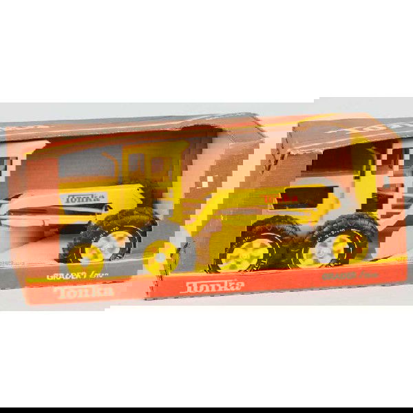 Pressed Steel Tonka Road Grader Toy.: Circa 1970s. Very little overall wear. Includes original box marked "2510 Grader". Size: 17" L.