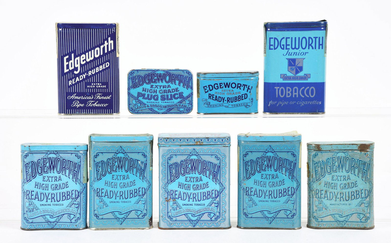 LOT OF 9: EDGEWORTH TOBACCO TINS.: This is a lot of nine Edgeworth Tobacco tins. There are seven pocket tins in large and medium formats, some with tax stamps in various stages of completeness. There is also a medium size rectangular t