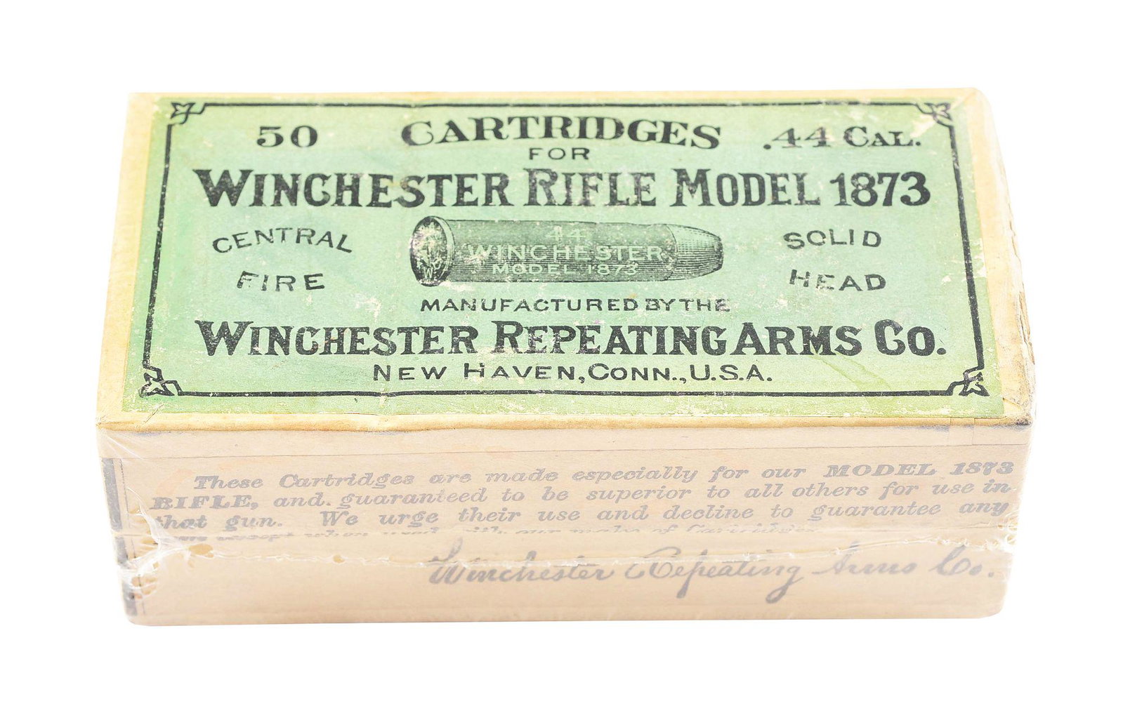 ANTIQUE BOX OF WINCHESTER .44-40 SHELLS FOR THE 1873: Winchester tan two piece box with green top label and tan side label. Full and correct with an "W.R.A. CO / 44 W.C.F." head stamp. Box has been opened. Top label reads "50 CARTRIDGES 50 / FOR / WINCHE