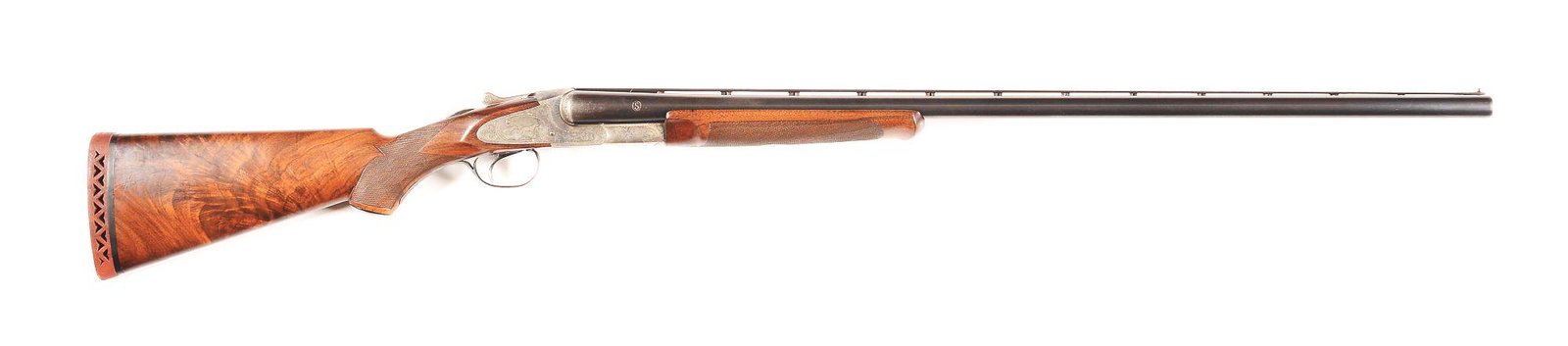 (C) L.C. SMITH CROWN GRADE 12 GAUGE SIDE BY SIDE: L.C. Smith Crown Grade side by side shotgun made by the Hunter Arms Company in Fulton, New York in 1926. Blued Crown Steel barrels with full factory ventilated rib, twin bead sights, and ejectors. Bar