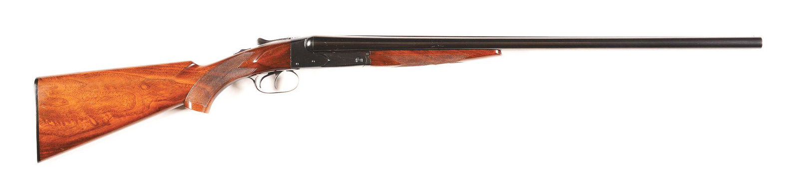 (C) WINCHESTER MODEL 21 SIDE BY SIDE SHOTGUN.: Winchester Model 21 side by side shotgun made by Winchester Repeating Arms in circa 1932. Blued Winchester Proof Steel barrels with matted rib and bead front sight with ejectors. Barrels are marked wi