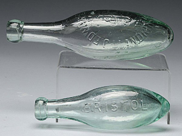 Lot of 2: Grenade Style Bottles.: Includes one marked "William Summers & Company" from Bristol and one "J Edwards & Company". Size: Largest: 9" T.