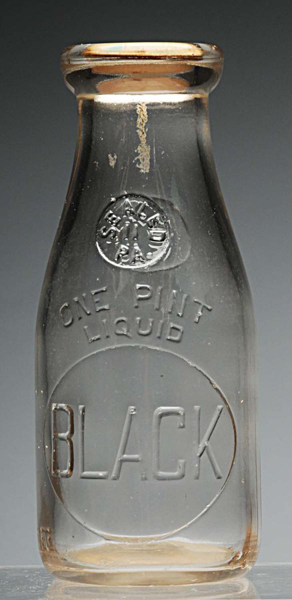 Black Dairy Milk Bottle.: Perry County, PA. Pint size. Size: 7 - 1/4" T.