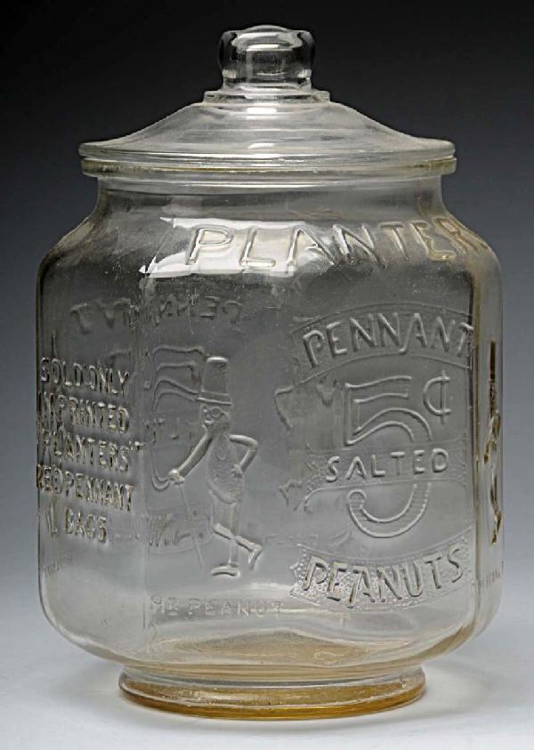 Vintage Glass Planters Peanuts Octagonal Jar.: With "5 cents" written on it. Plane top. No cracks or breaks. Size: 13" T.