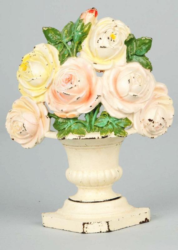 Cast Iron Roses Flower Doorstop.: Description Manufactured by Hubley. Numbered "445". Condition (Excellent). Size 8 - 1/2" T.