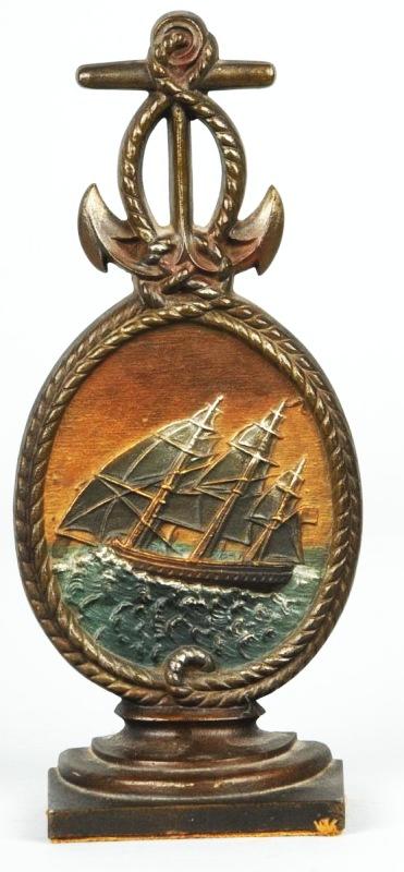 Cast Iron Sailing Vessel Doorstop.: Description Manufactured by Bradley and Hubbard. Embossed medallion with rope and anchor. Condition (Excellent). Size 11 - 1/2" T.