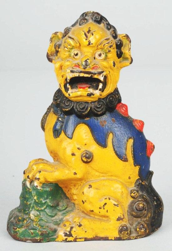 Cast Iron Foo Dog Doorstop.: Description Full-figure. Condition (Very Good Plus). Size 7" T.