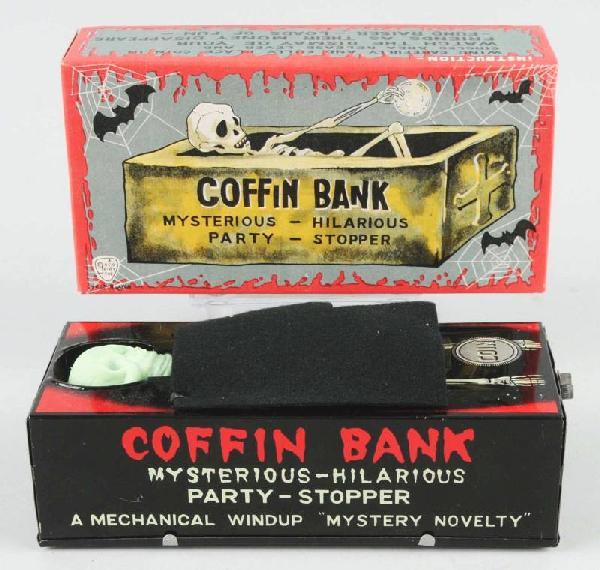 Tin Coffin Mechanical Bank.: Description Japanese. Circa 1960s. Working. Includes original box. Condition (Near Mint). Size 6 - 1/2" L.