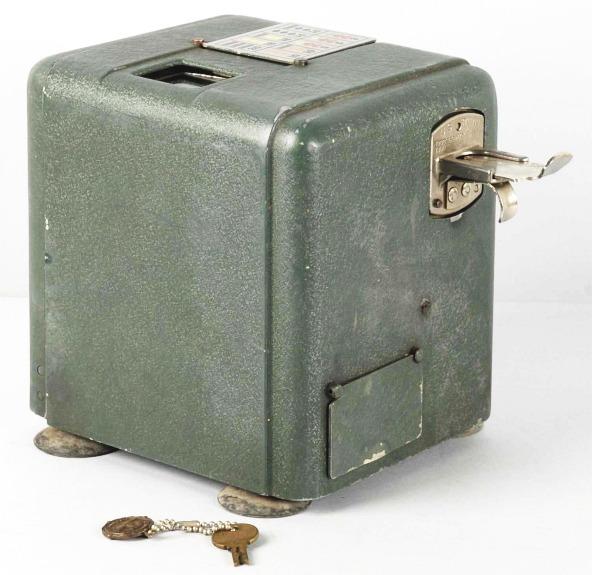 Green Vest Pocket Coin-Op Machine with Key.: Patent date is 1933. Working. Size: 8 - 1/2" T.
