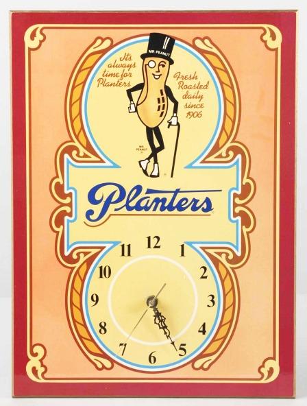 Planters Peanut Wall Clock.: Working. Size: 12 - 1/2" x 17".