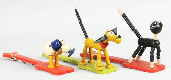 Lot of 3: Fisher Price Pop-Up Paddle Toys.: Includes one Donald Duck, one Pluto, and one Tailspin Tabby. Some minor to moderate wear throughout and Donald is missing arms. Size: Largest: 5" T.