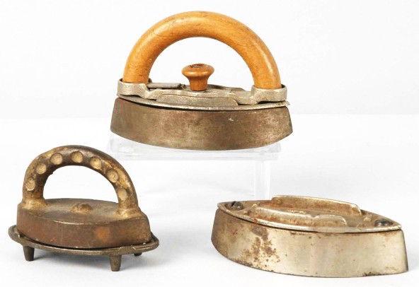 Lot of 3: Vintage Cast Iron Iron Toys.: American. Includes one with trivet and one missing its wooden handle. Some overall wear. Size: Largest: 3 - 3/4" L.