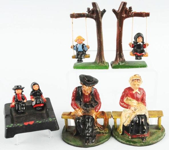 Lot of 4: Cast Iron Amish Items & Bookends.: Manufactured by Wilton. Includes Amish Man and Woman bookends, two Amish Boys and one Girl on Swings, and Sitting Amish Boy and Girl Ash Tray. Size: Largest: 5" T.