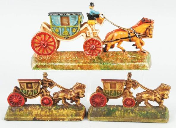 Lot of 2: Cast Iron Coach Doorstop & Bookends.: Manufactured by Hubley. Doorstop numbered "376" and bookends numbered "303". Size: Largest: 11" x 5 - 3/4".