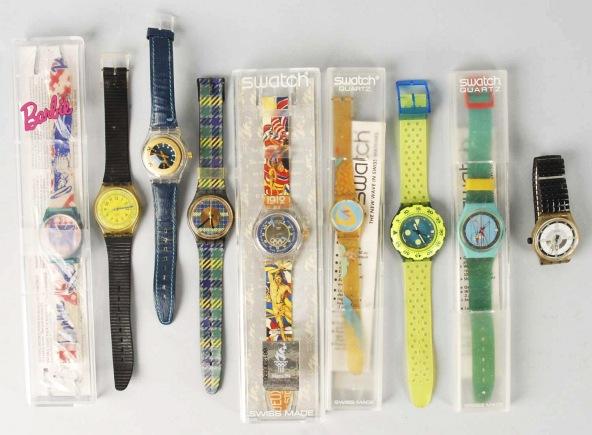 Lot of 8: Vintage Swatch Watches.: Swiss made. Includes Atlanta 1996 Olympic Watch, Barbie, and others. Includes four in their original boxes. Size: