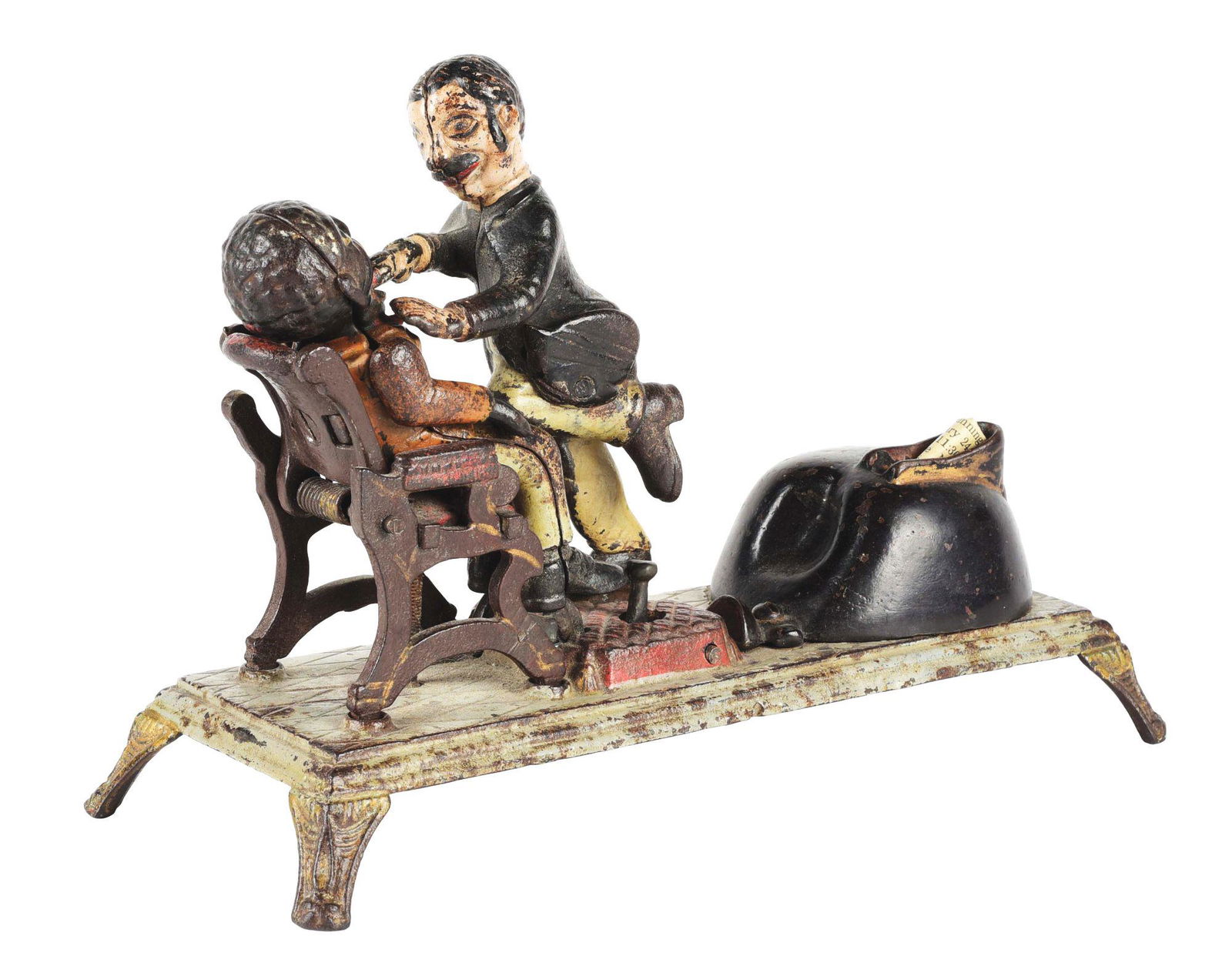 J. E. STEVENS CAST IRON DENTIST MECHANICAL BANK. (1 of 5)