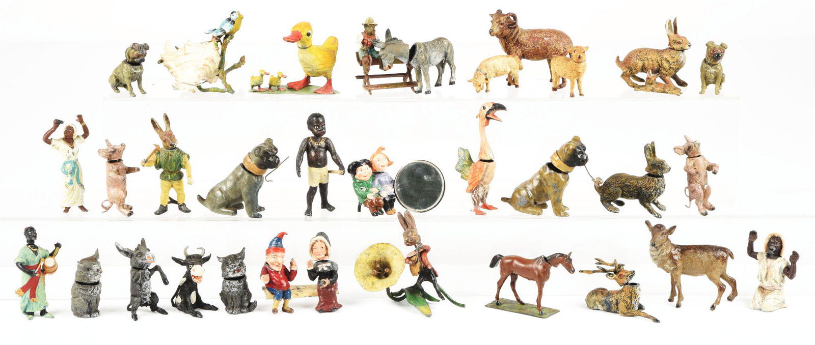 LARGE LOT OF FIGURAL CAST-IRON AND POT METAL FIGURINES (1 of 1)