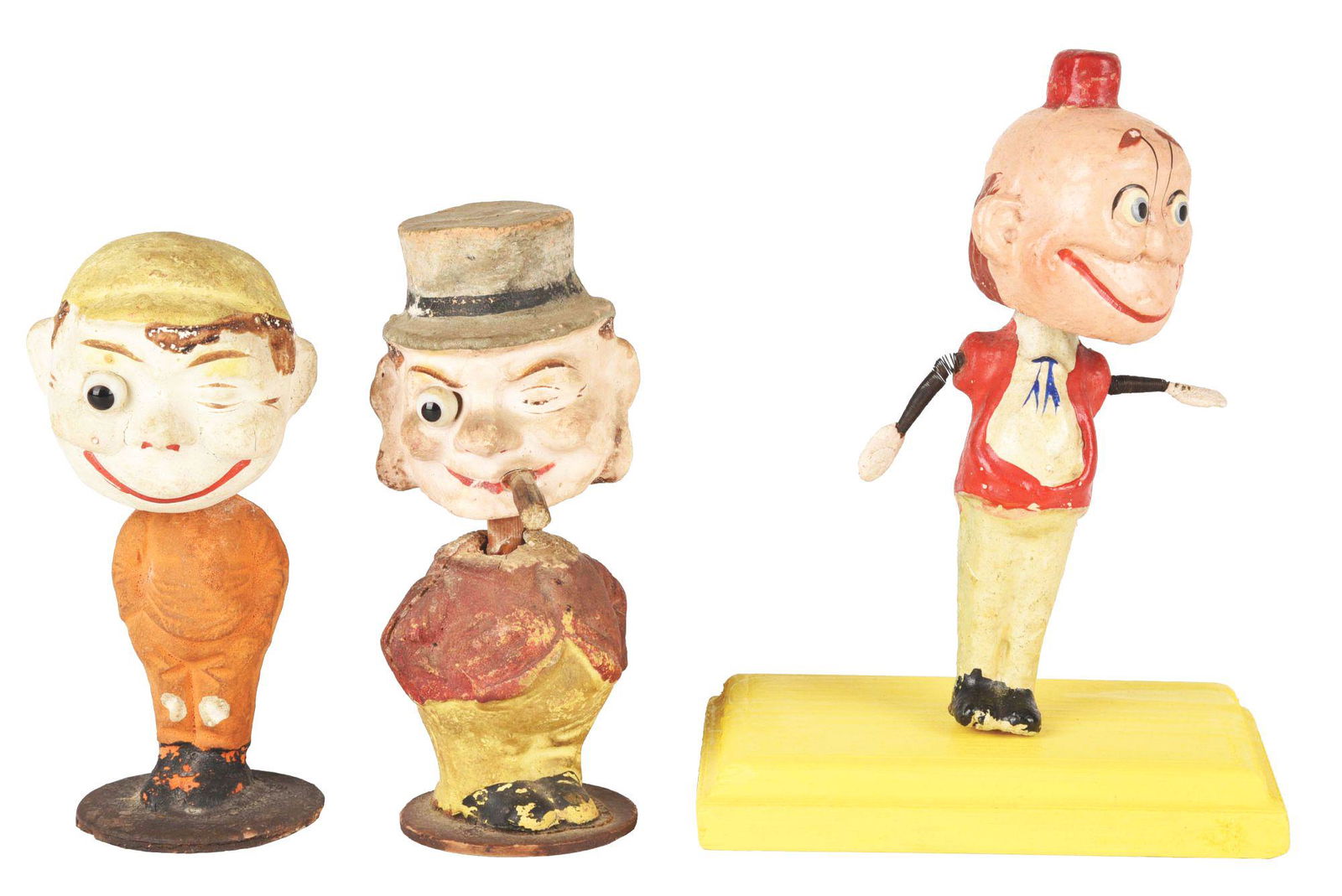 LOT OF 3: COMPOSITION BOBBING HEAD FIGURES. (1 of 4)