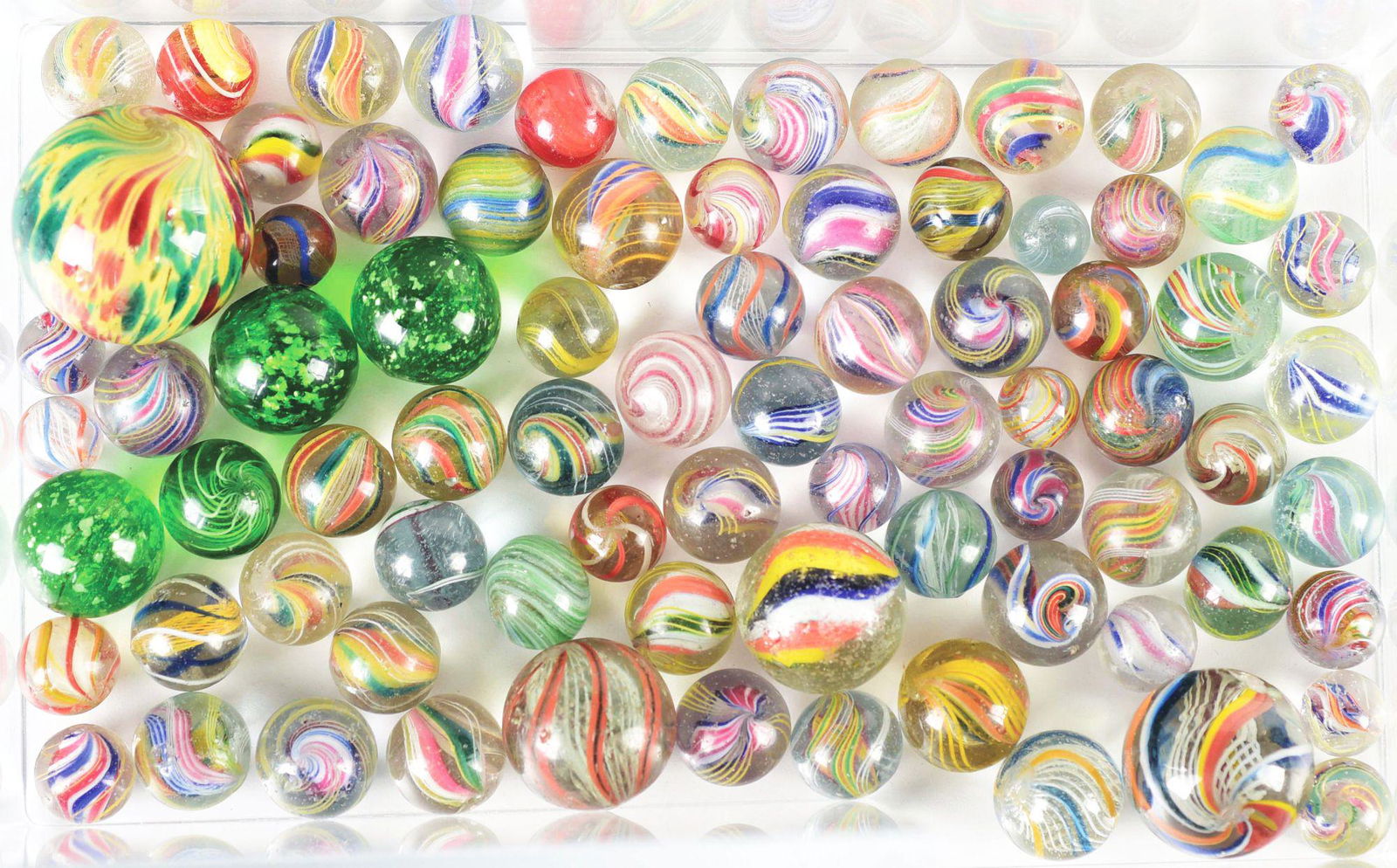 LOT OF APPROXIMATELY 78 HAND MADE MARBLES. (1 of 1)