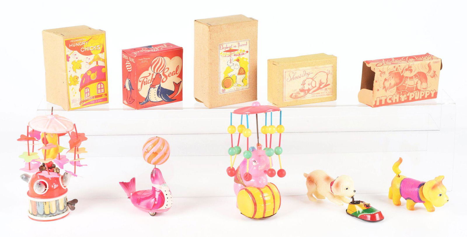 LOT OF 5: MOSTLY OCCUPIED JAPANESE CELLULOID WIND-UP (1 of 4)