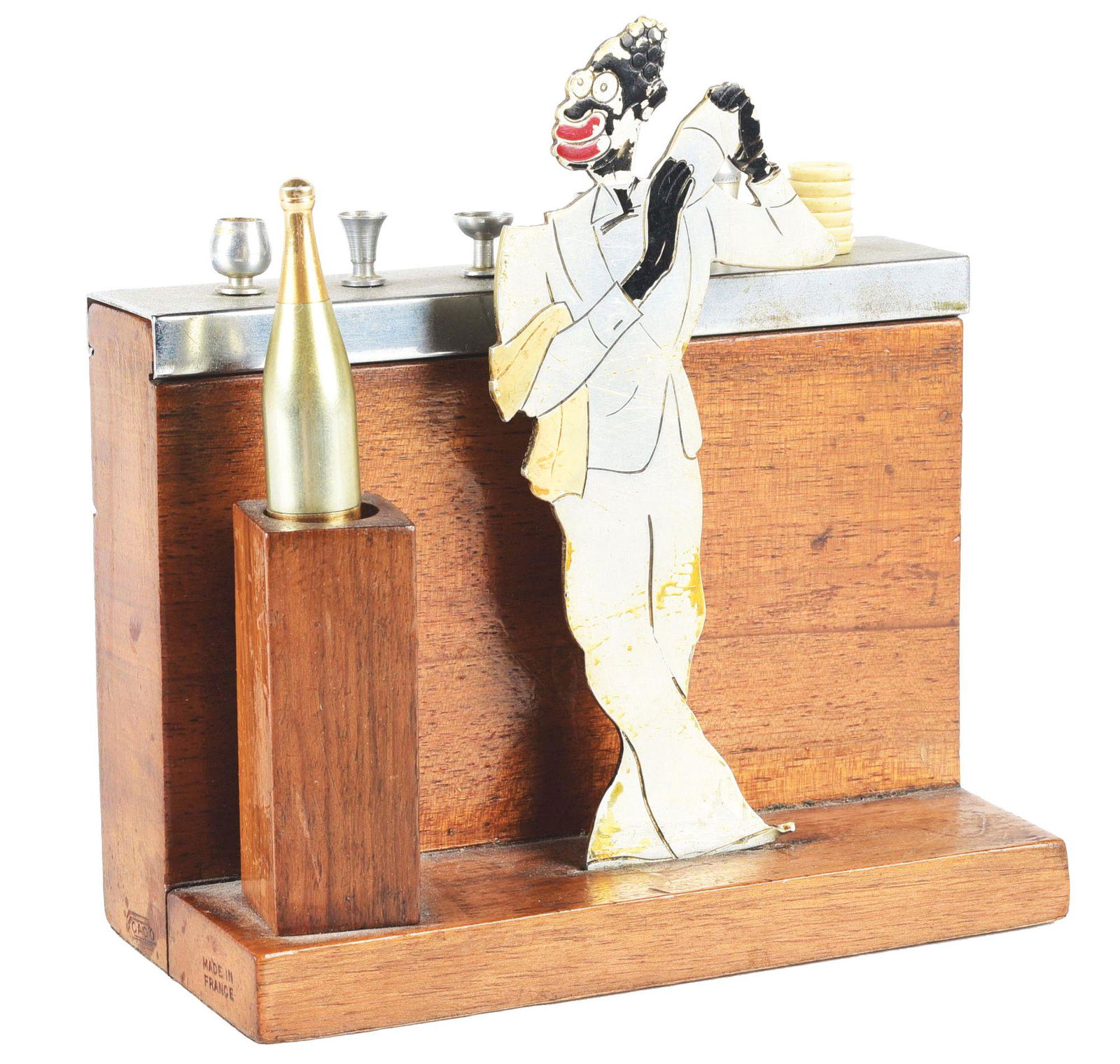 EARLY ART DECO BLACK-THEMED BAR ORNAMENT. (1 of 4)