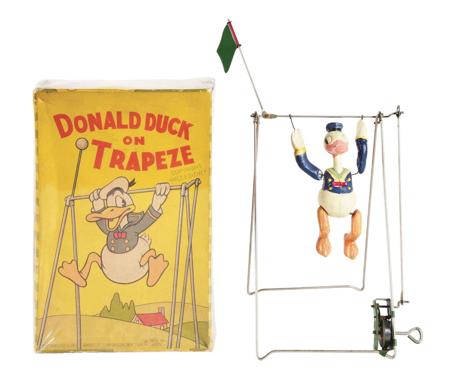 WALT DISNEY CELLULOID DONALD DUCK ON TRAPEZE TOY. (1 of 3)