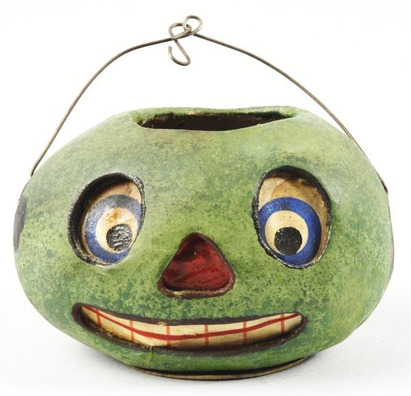 Composition Watermelon Jack-O-Lantern.: German. Very unusual. Gorgeous paint and original paper labels. Size: 2 - 1/4" T.