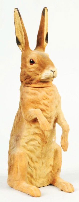 Papier Mache Rabbit Candy Container.: German. Felt-like body with glass eyes. All original paint and ears are intact. Old repair to the left leg and possibly to the left upper leg, but done very well. Closure is tight to the candy contain