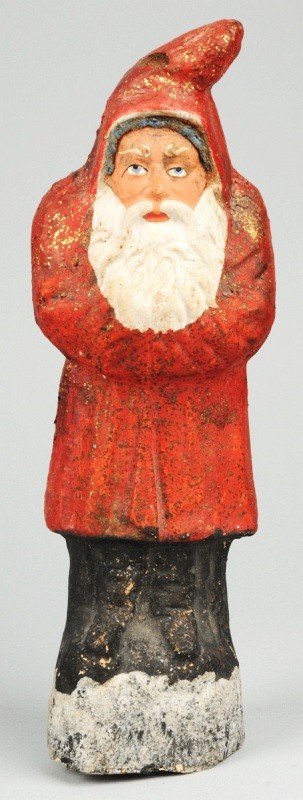 Christmas Santa Belsnickle.: Red coat. Chip on hat and several on back. Size: 10" T.