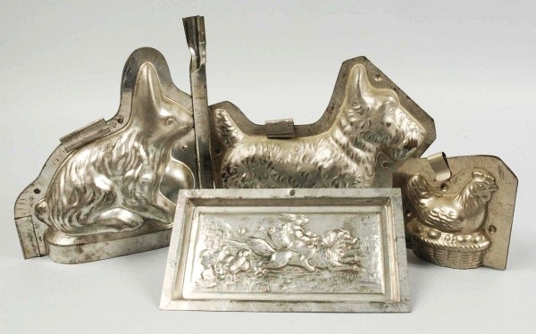Lot of 4: Metal Chocolate Molds.: Includes one Scotty dog, one bunny, one chick on nest, and one flat rabbit. Size: Largest: 8" L.