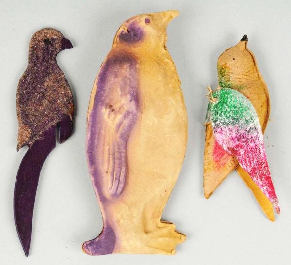Lot of 3: German Dresden Ornaments.: Includes one parrot, one bird with wings, and one penguin. Some rubbing throughout. Size:
