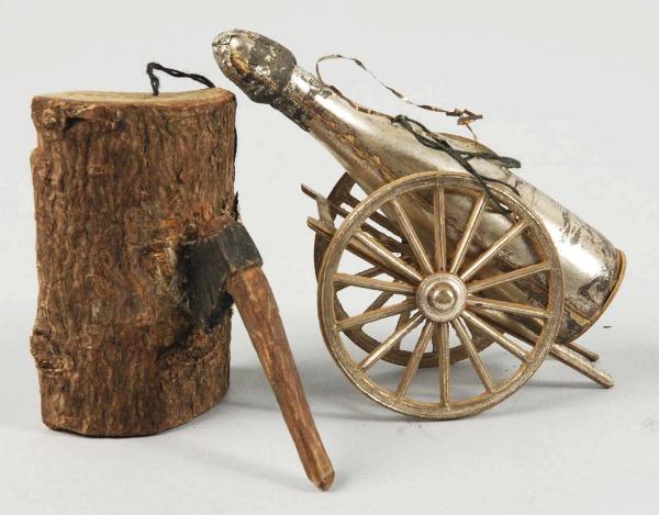 Lot of 2: German Dresden Ornaments.: Includes one champagne bottle on wheels and one hatchet in wood block. Size: