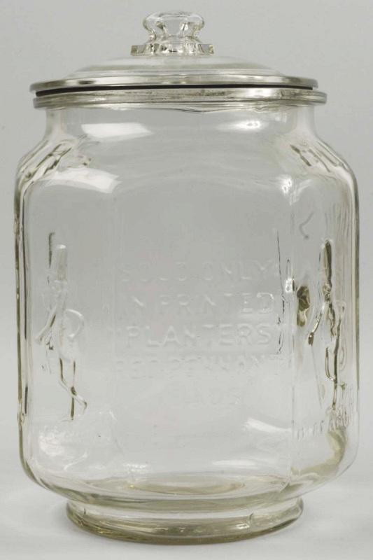 Planters Peanut Octagonal-Shaped Jar.: With Mr. Peanut on four sides and "USA" written on bottom. No chips or cracks. 12" T. (Excellent).