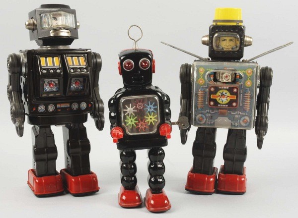 Lot of 3: Robot Battery-Op & Wind-Up Toys.: Japanese. Working. Includes Rotate-O-Matic Astronaut, Gun Firing Astronaut, and small Six Gear Robot. No cracks to chest plates. Largest: 12" T. (Very Good - Excellent).