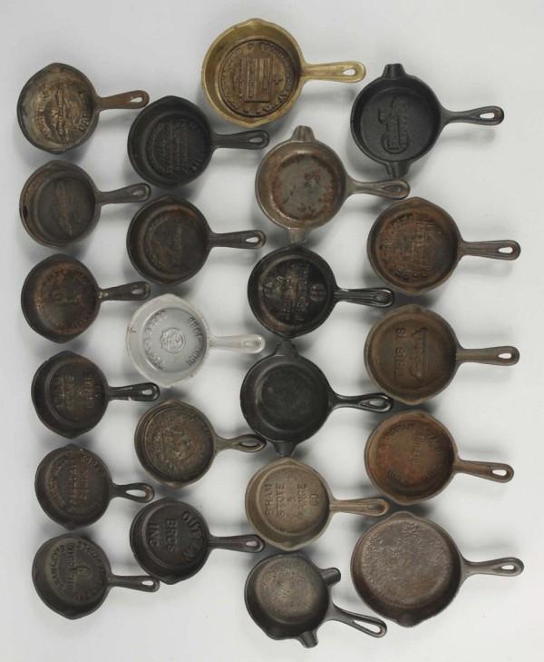 Lot of 26: Cast Iron Advertising Frying Pans.: Nice grouping. 3 - 1/2" Dia. (Very Good - Excellent).