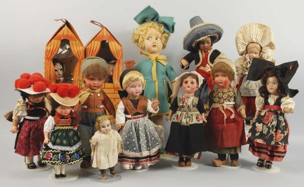 Large Lot of Dolls.: Includes two marionettes in boxes and 11 other dolls. Dolls includes one with celluloid face and blonde hair, one with celluloid face and red balls on hat, Lenci-type dolls, and others. Largest: 18 - 