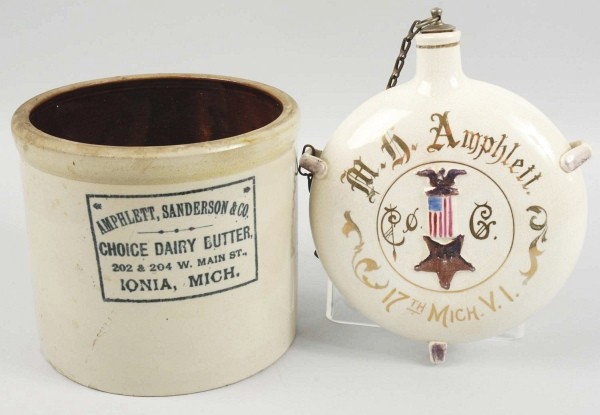 Lot of 2: Stoneware Crockery Pieces.: Includes one Amphlett Civil War canteen made of pottery with some eagle, flag, and star on front. Also includes one Dairy Butter stoneware piece. Both pieces have no damage with just some minor crazin