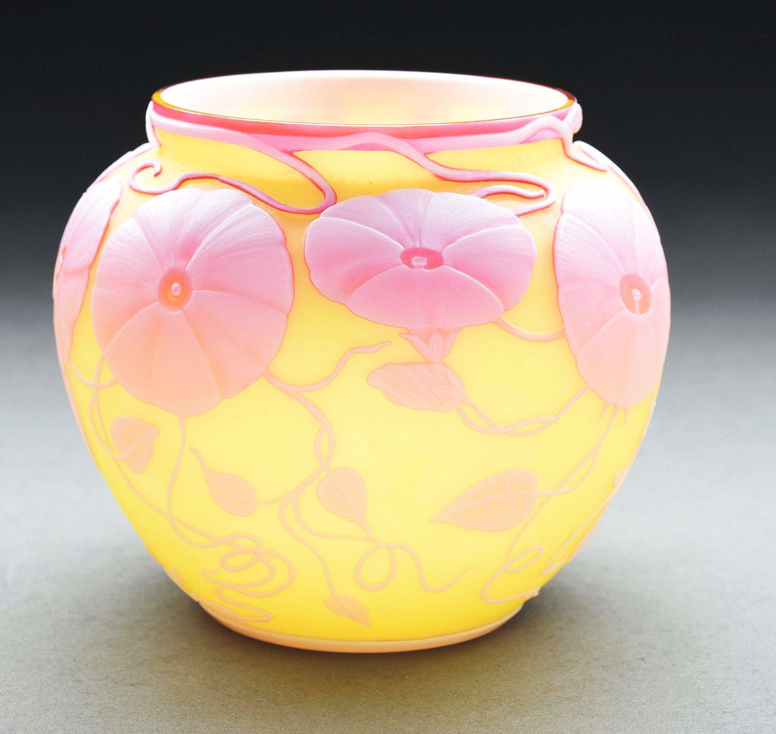 CAMEO ART GLASS VASE.: Cameo art glass vase, probably English and possibly Webb. Yellow background with purple embossed petunias, flowers and vines. 4 - 1/2" T x 3 - 1/2" Dia. No damage, chips, cracks or scratches. Conditio