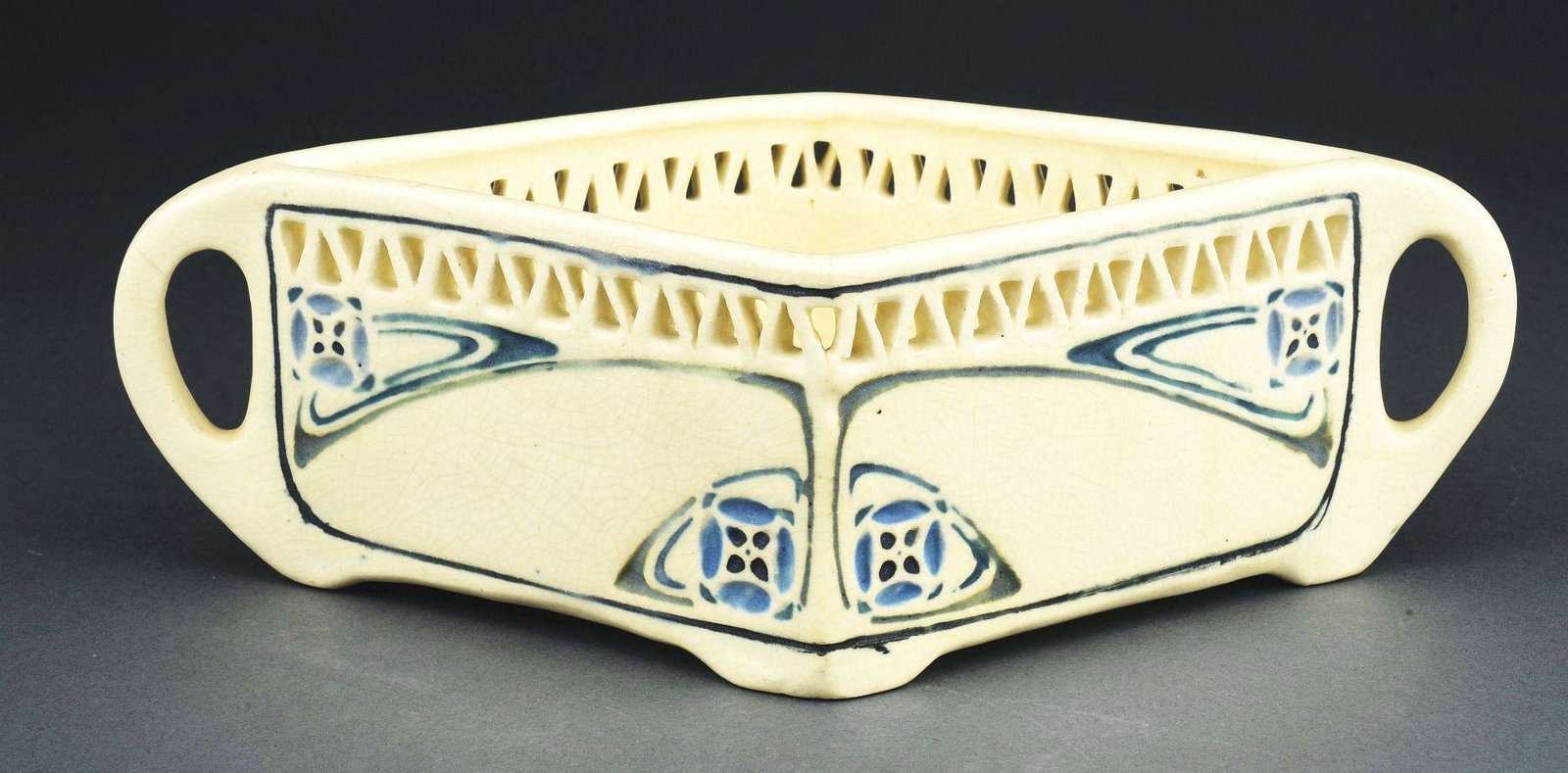 WELLER CREAMWARE SECESSIONIST JARDINIERE.: Weller Creamware Secessionist Jardiniere. Condition: (Mint). Dimensions: 11 - 1/4" x 6 - 1/4" x 3 - 1/2".