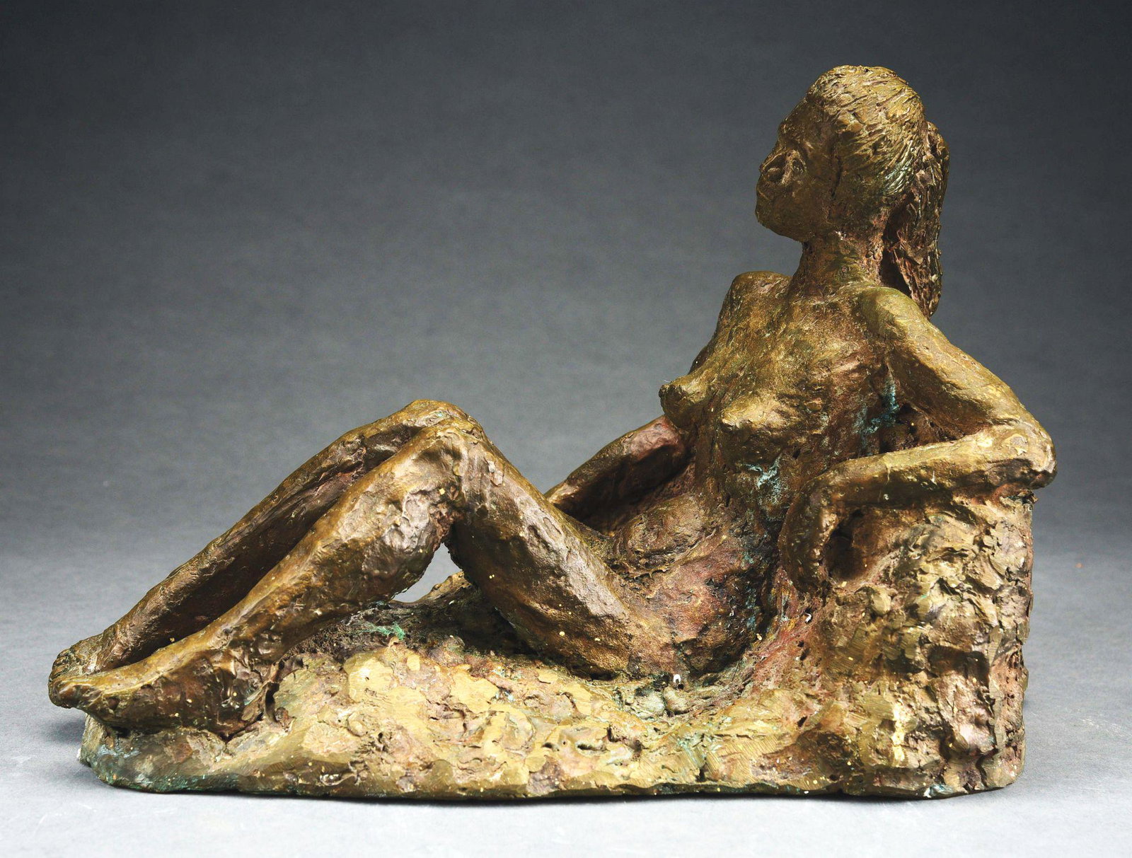 BRONZE FIGURE RECLINING NUDE WOMAN.: Unique detail and finish. Condition: (Excellent). Dimensions: 10 - 1/2" x 16" x 10".