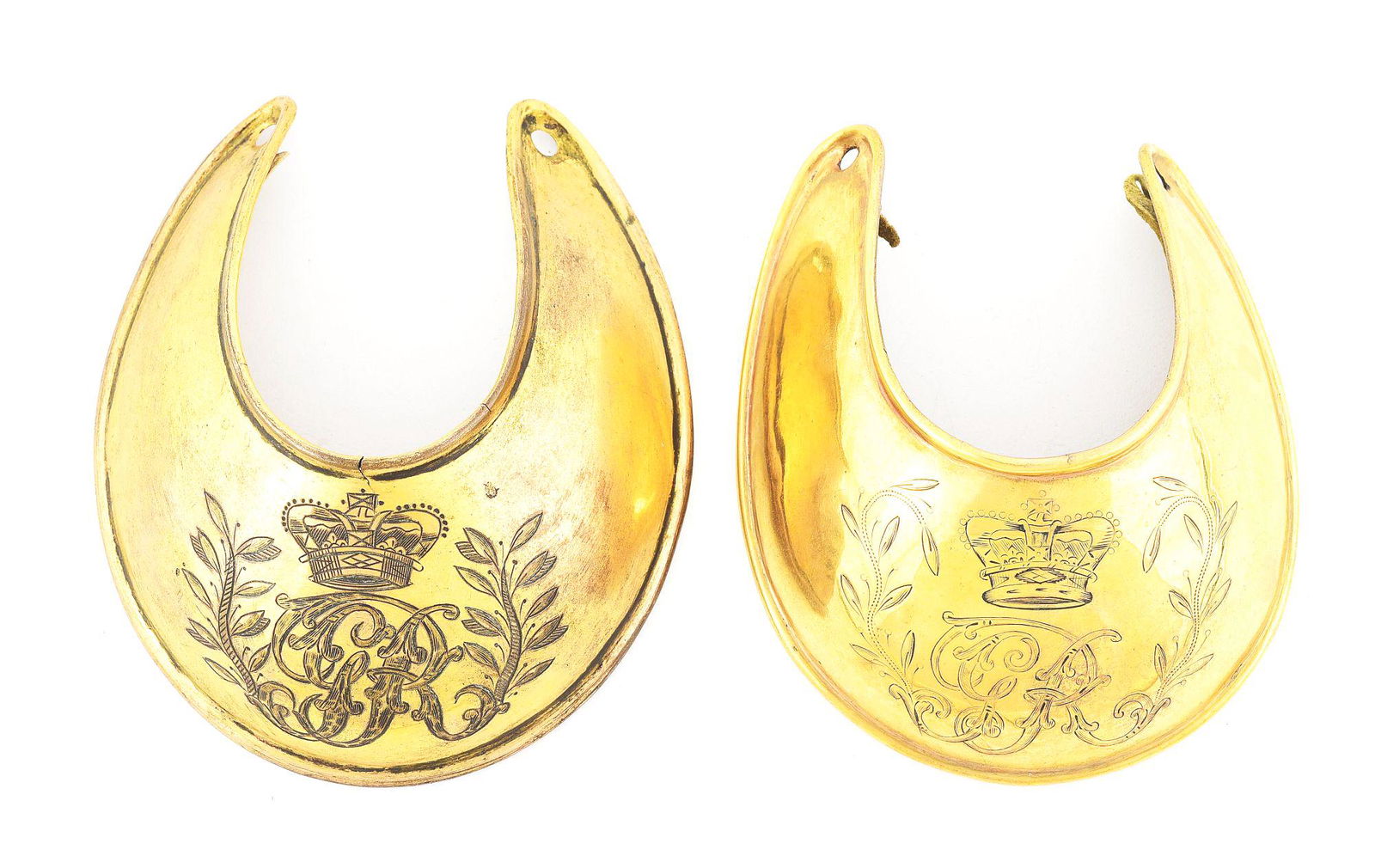 LOT OF 2: ORIGINAL NAPOLEONIC BRITISH OFFICER'S: Two gilt brass officer's gorgets with "GR" monogram in centers below a large crown. There are astute branches on both sides of the monograms. Both gorgets still retain their original buff leather back