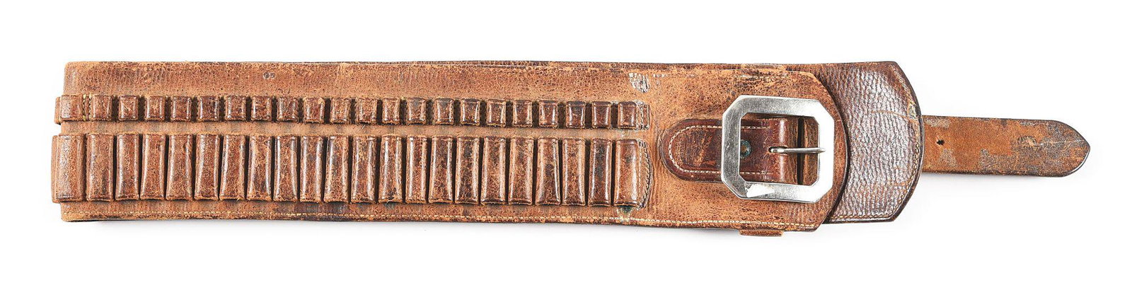 EARLY MONEY/RIFLE CARTRIDGE BELT.: Early 1900s money/rifle cartridge belt. Unmarked with typically seen square nickel-plated buckle. .25 & .30 caliber lever action rifle cartridges fit perfectly. Holds 44 rounds. CONDITION: Very good s