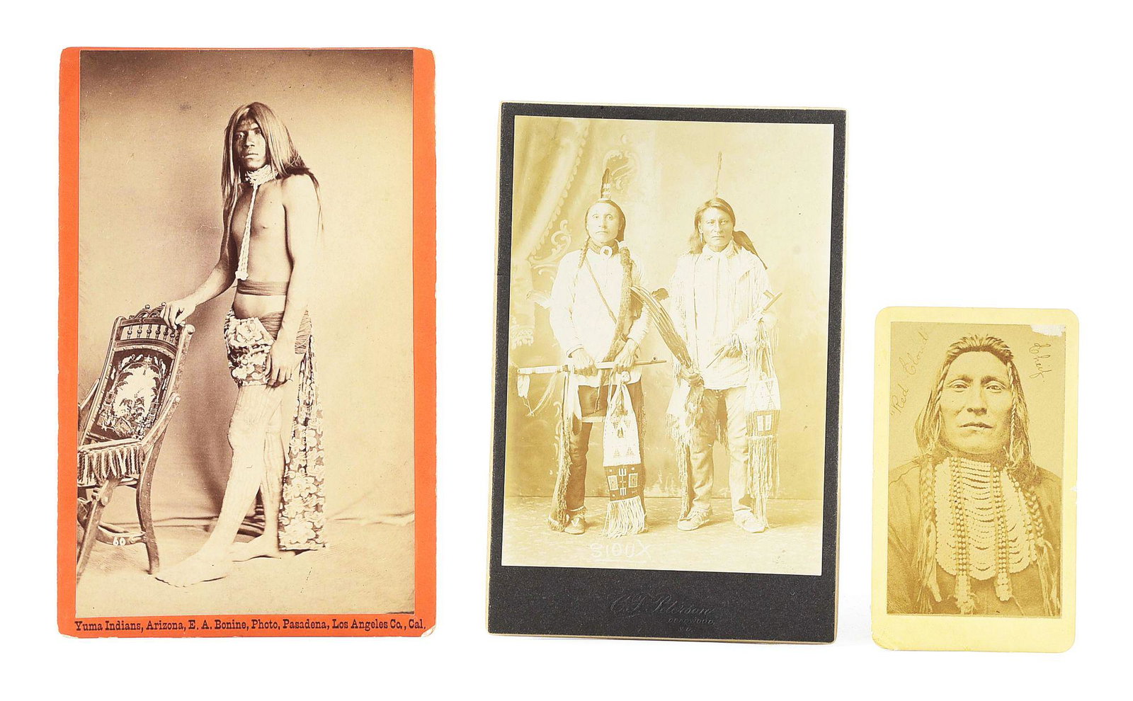 LOT OF 3: ANTIQUE NATIVE AMERICAN PHOTOS.: Lot consists of: (A) Sepia toned CDV image of Sioux chief Red Cloud, taken by E.L. Eaton, Omaha, Nebraska. Circa 1880's. Measures: 4.25" x 2.25." (B) Cabinet card photo of Standing Sioux Indians holdi