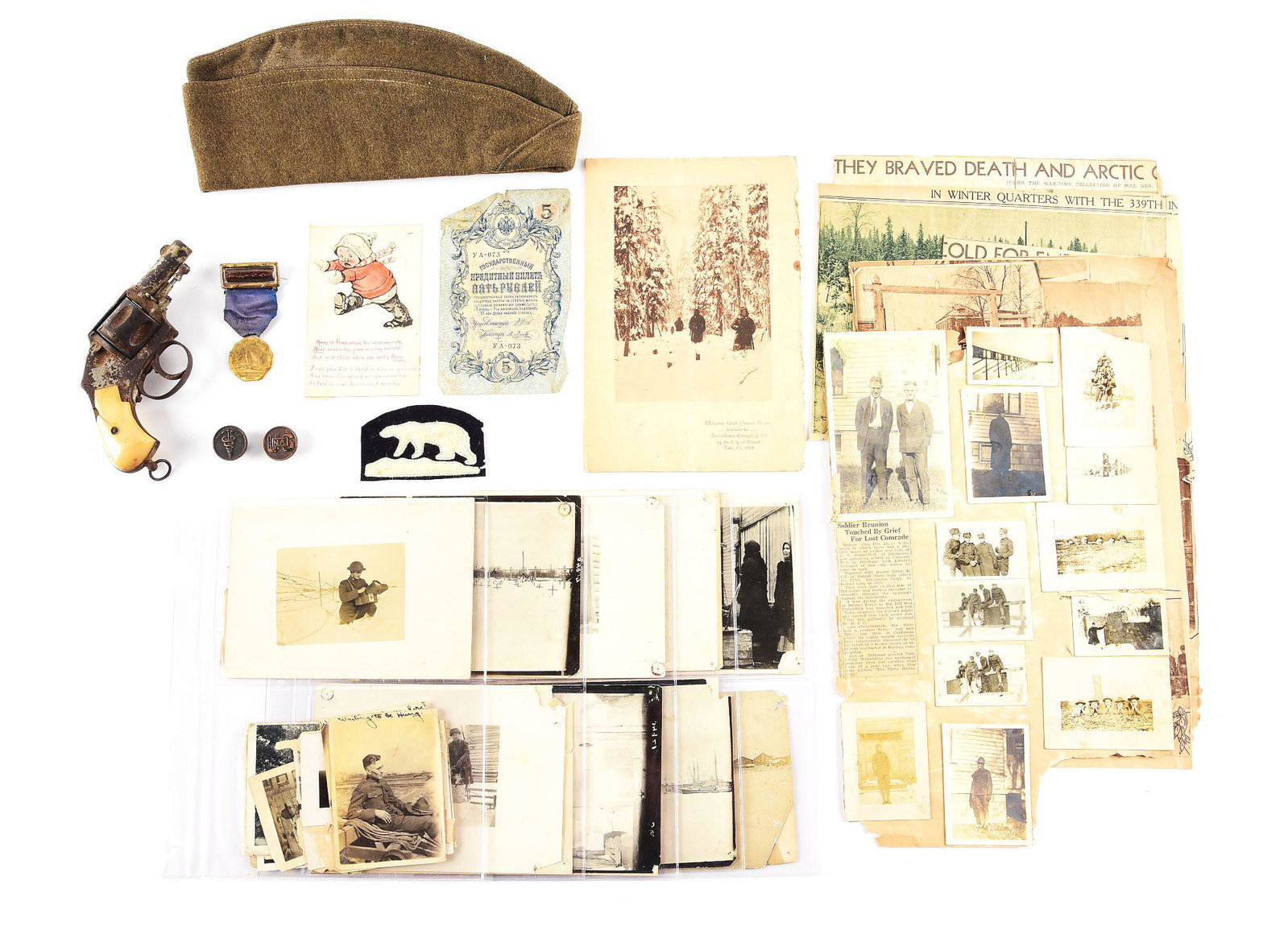 (C) US WORLD WAR I 339TH AMBULANCE COMPANY NORTH RUSSIA: Nice World War I 339th Ambulance Company photo, ephemera, and revolver grouping attributed to Edward Bertram. The grouping includes 29 large photos, 24 small photos, newspaper clippings, the menu for 