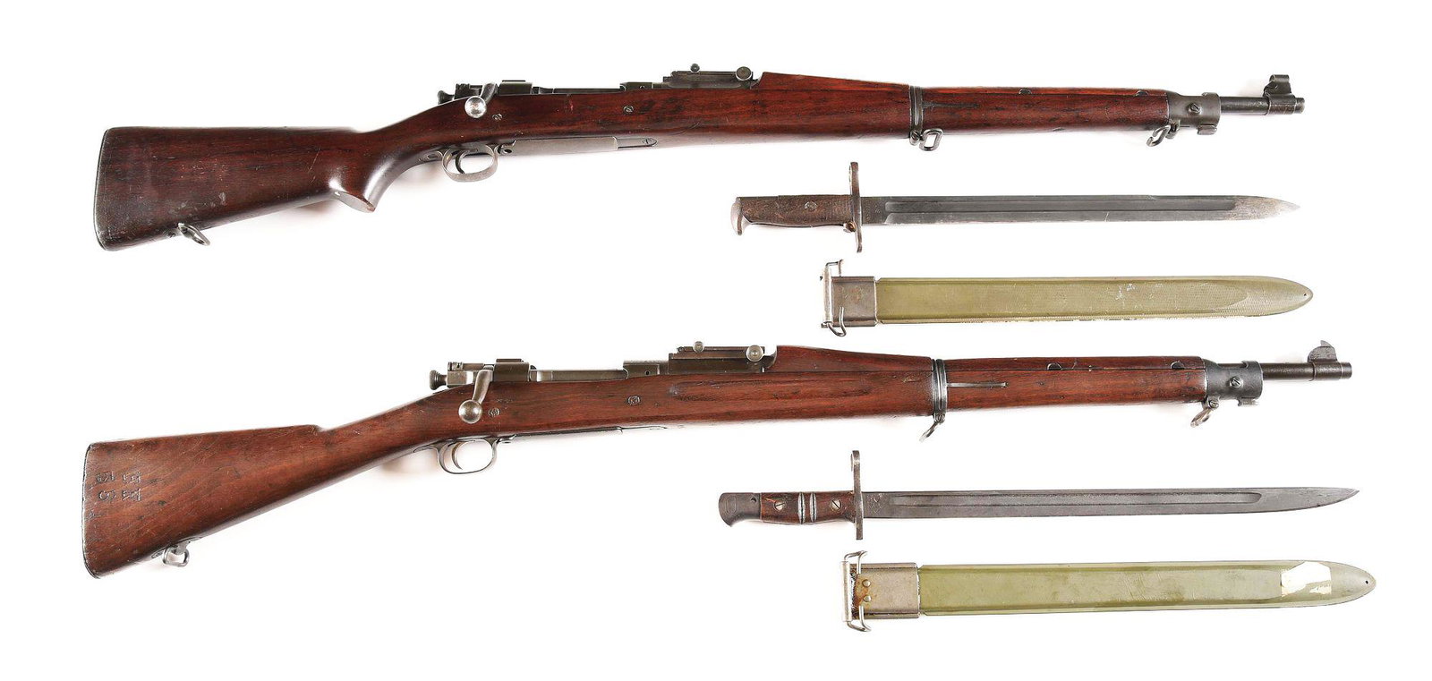 (C) LOT OF 2: SPRINGFIELD MODEL 1903 BOLT ACTION RIFLES: Lot consist of: (A) Springfield Model 1903 bolt action rifle with bayonet. Made 1937 with a Springfield production "9-38" dated barrel. Swept back bolt handle, marked "NS" on the top. "AAA" arsenal st