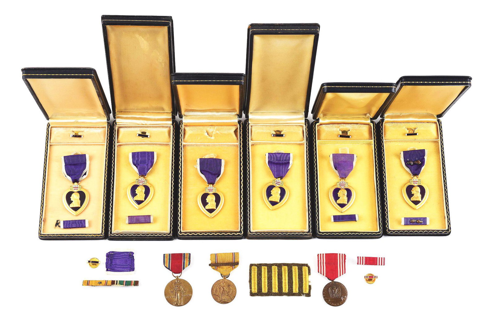 LOT OF 6: US WWII UNENGRAVED PURPLE HEART MEDALS: Lot consists of (A) World War II Rex Products slot brooch Purple Heart numbered "298243" on the lower left side with a Purple Heart ribbon bar, theater made pinback ribbon bar with American Defense an