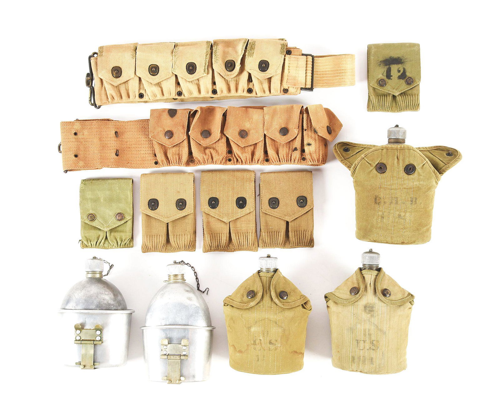 LOT OF 12: US WORLD WAR I SEAMLESS CANTEENS, M1911: Lot consists of (A) M1910 khaki cartridge belt. The belt is marked by Mills on the right side and Russell on the left side. CONDITION: The belt exhibits several repairs around the edges of the flaps a