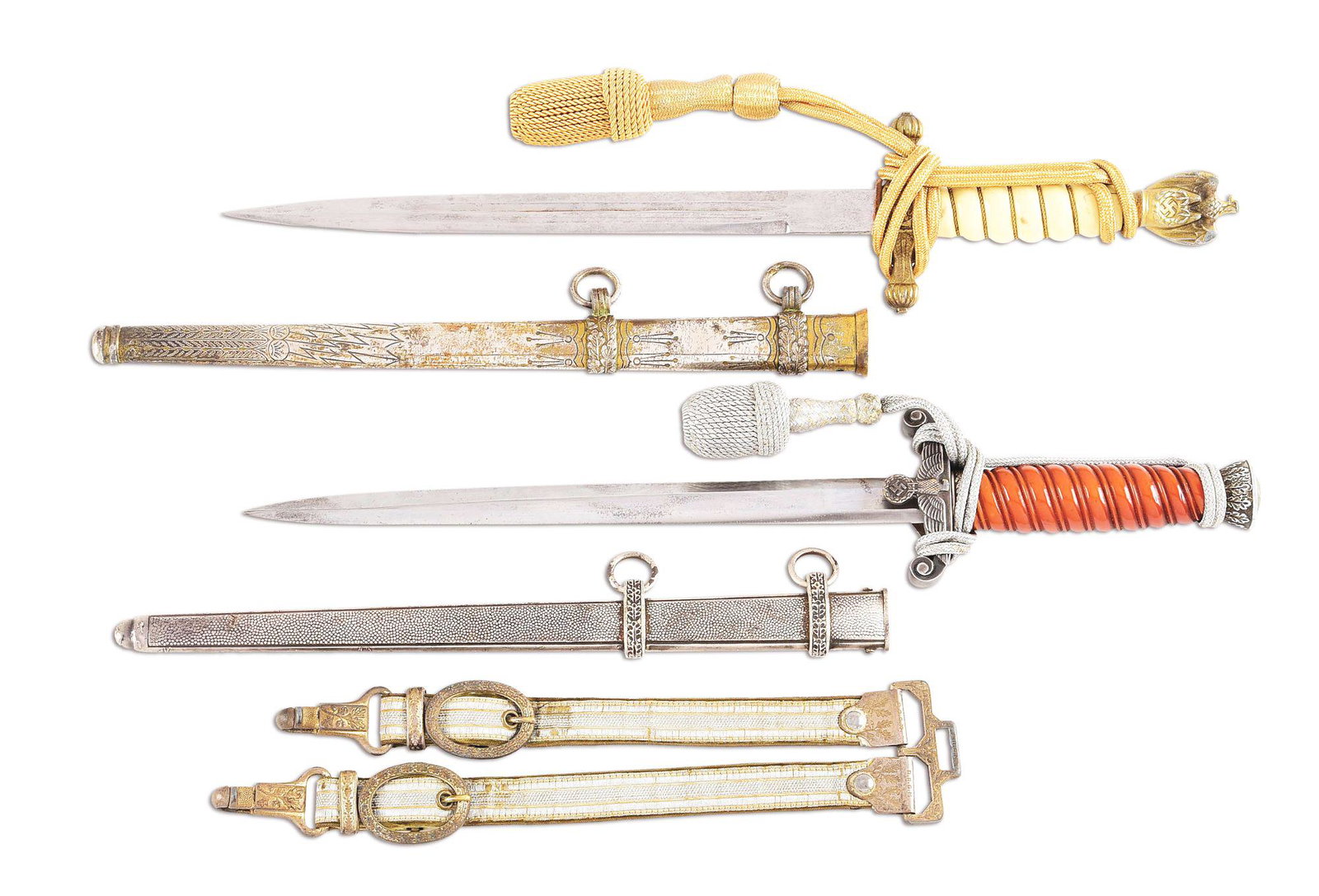LOT OF 2: THIRD REICH HEER AND KRIEGSMARINE DAGGERS: Lot contain: (A) Kriegsmarine dagger with with an unmarked nickel plated blade, with very light scratches and light staining/ freckling throughout. The zinc fittings retain 75-80% of their gilt finish